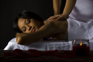 Woman receiving massage.